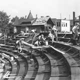 Building the centerfield bleachers, with Ricketts on the rooftop in 1937